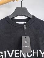 Dark crewneck sweatshirt collar with zip tag and Givenchy logo label