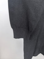 Dark sweatshirt sleeve with ribbed cuff and knit hem