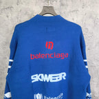 Blue sweater back view with red balenciaga logo and white SKWEAR text