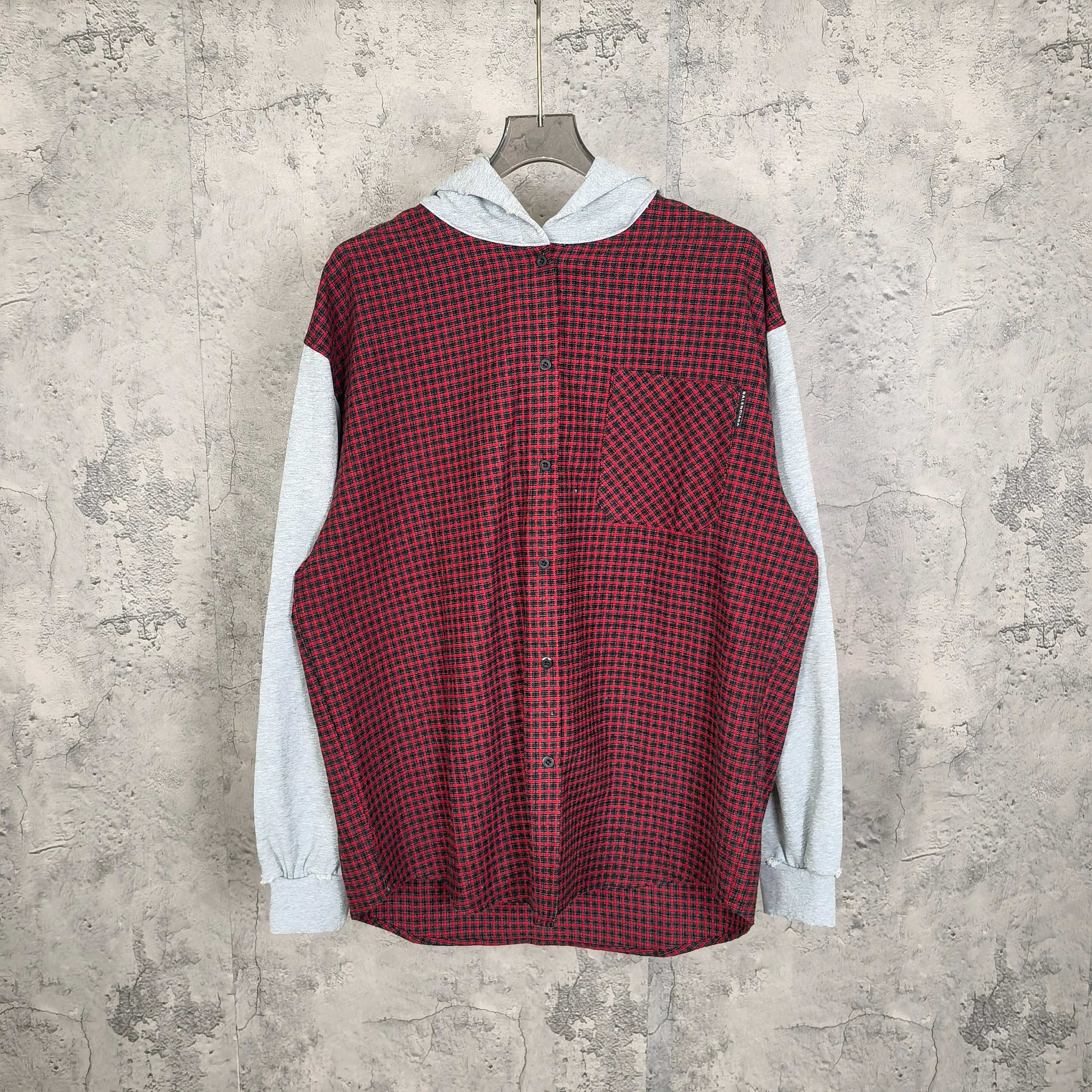 Red and black check long-sleeve hoodie with light gray hood and front pocket
