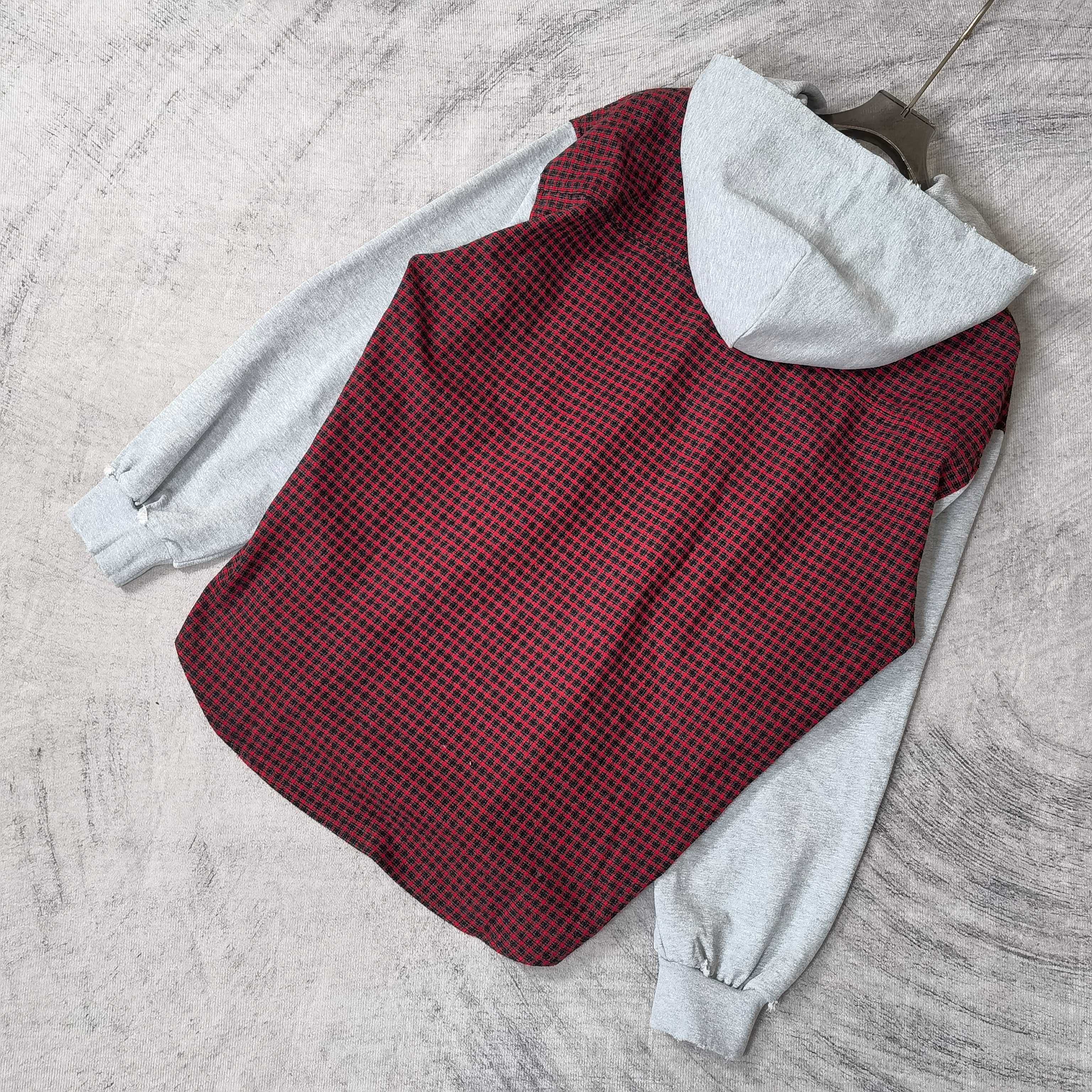 Red and black check hoodie vest with light gray hood and long sleeves