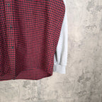 Red and black check hoodie with light gray cuff on long sleeve