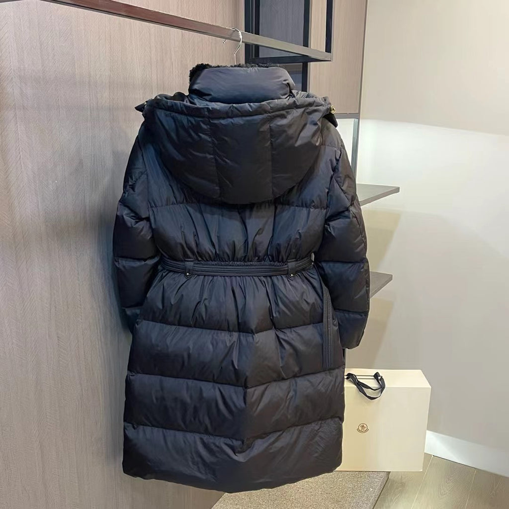 Long black puffer coat with hood, belt, and back view