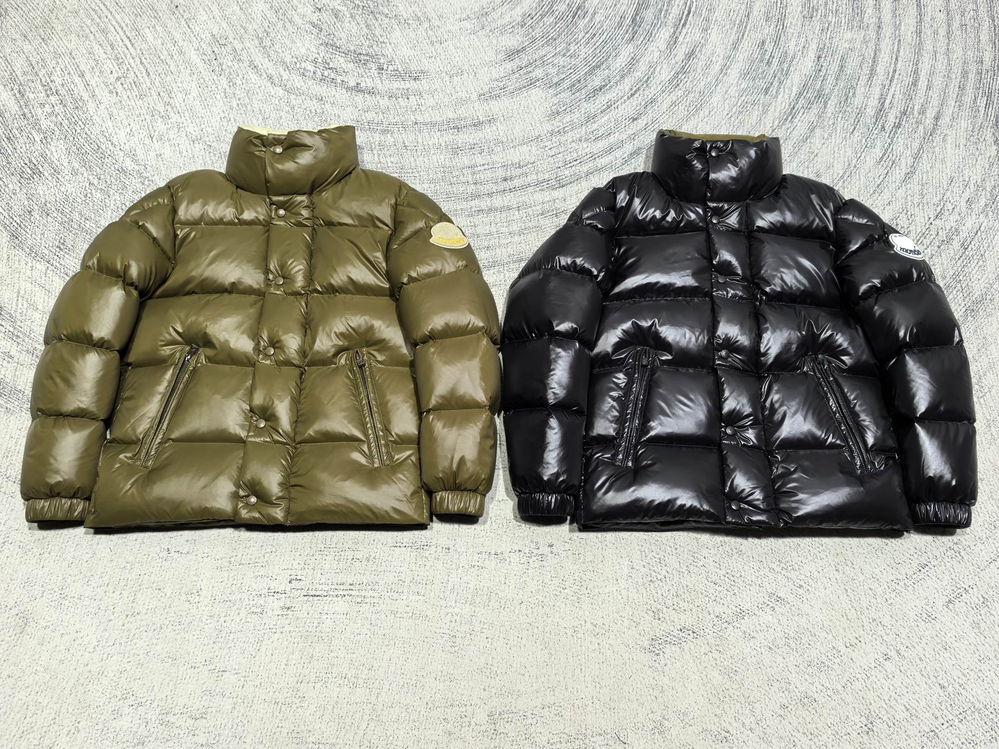 Moncler puffer jacket pair: olive green and black, quilted padded fronts