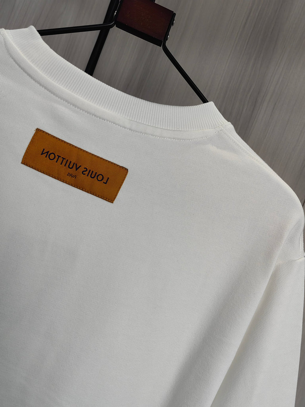 White sweatshirt with back neck label and plain back design