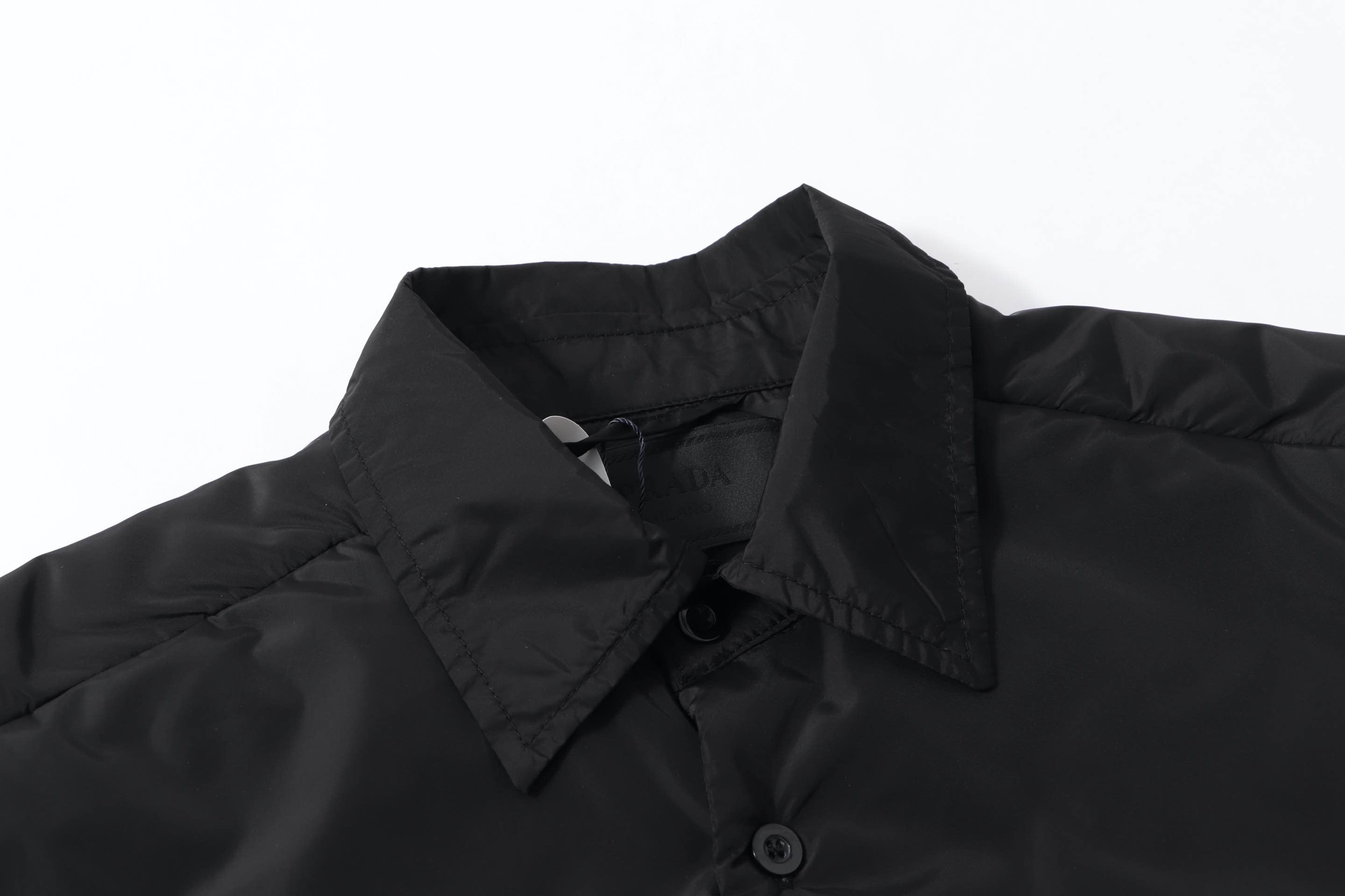 Black Prada button-up shirt collar with button placket