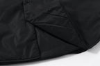 Black Prada shirt sleeve with diagonal stitched panel and button