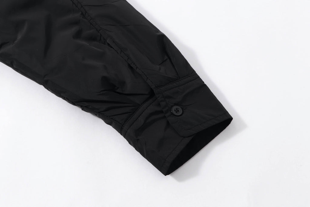 Black Prada button-up shirt sleeve cuff with button closure