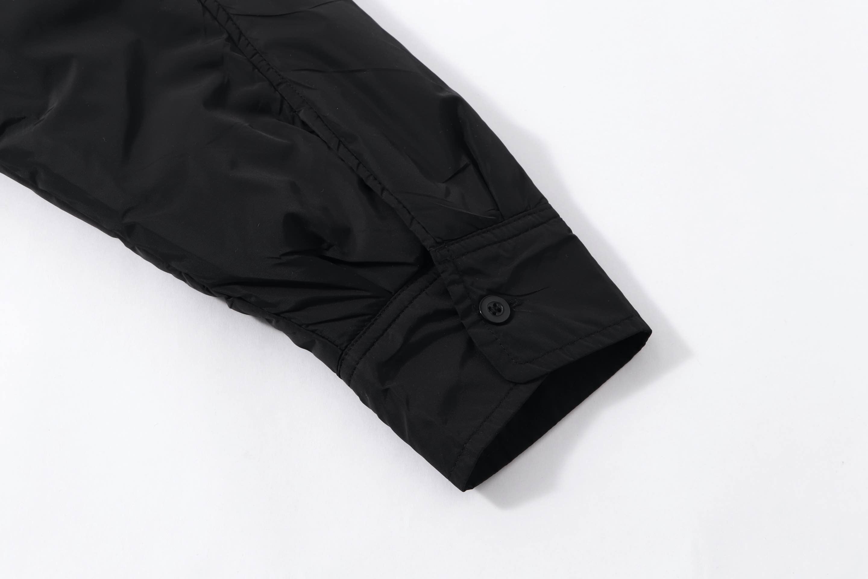 Black Prada button-up shirt sleeve cuff with button closure