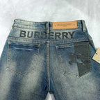 Burberry blue denim jeans front with large patch pockets and logo waistband