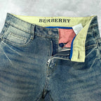 Burberry blue denim jeans with yellow waistband lining and visible inner tags