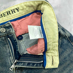 Burberry jeans waistband lining with pink fabric, inner label, and zipper