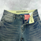 Burberry blue denim jeans top view with yellow contrast waistband and zipper fly