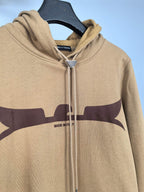 Tan zip-up hoodie with large chest graphic, crest zipper pull, “Made in Italy”