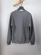 Dior long-sleeve crewneck sweatshirt in heather gray, back view