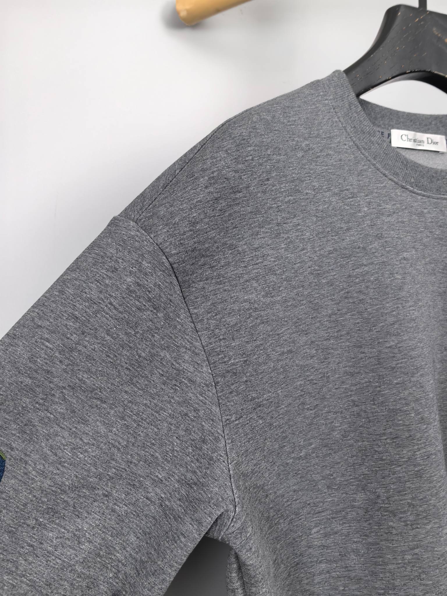 Dior long-sleeve sweatshirt in heather gray with clean sleeve seam