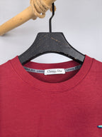 Red crewneck sweatshirt with Christian Dior neck label detail
