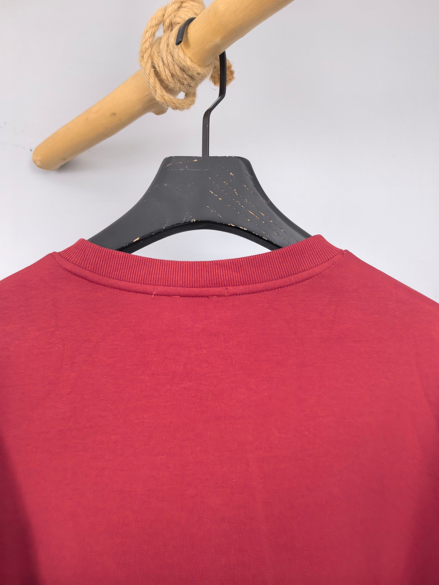 Red sweatshirt back with ribbed crewneck collar