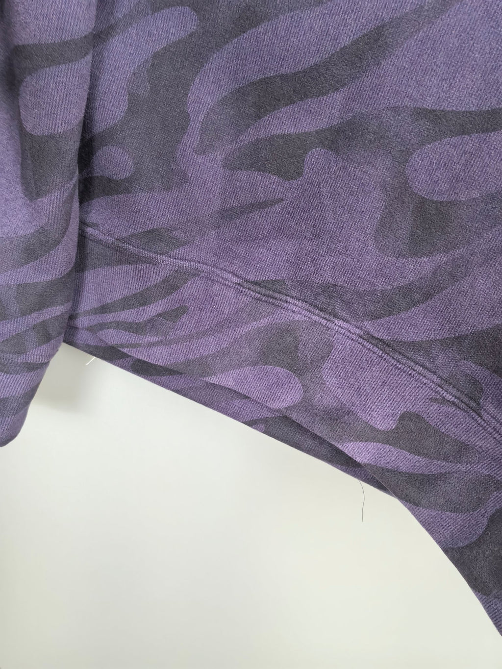 Off-White crewneck sweatshirt sleeve detail, purple camo print