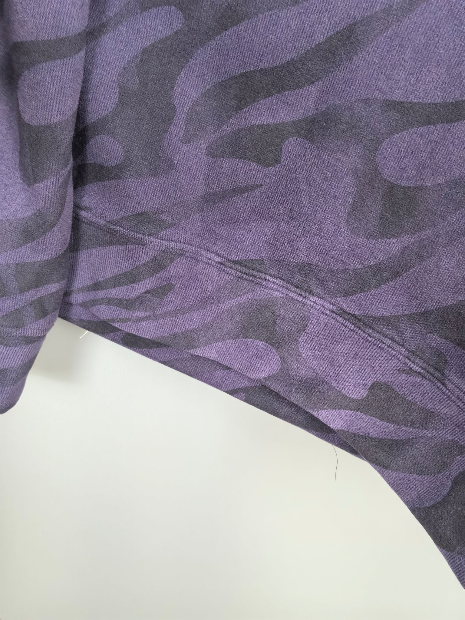 Off-White crewneck sweatshirt sleeve detail, purple camo print