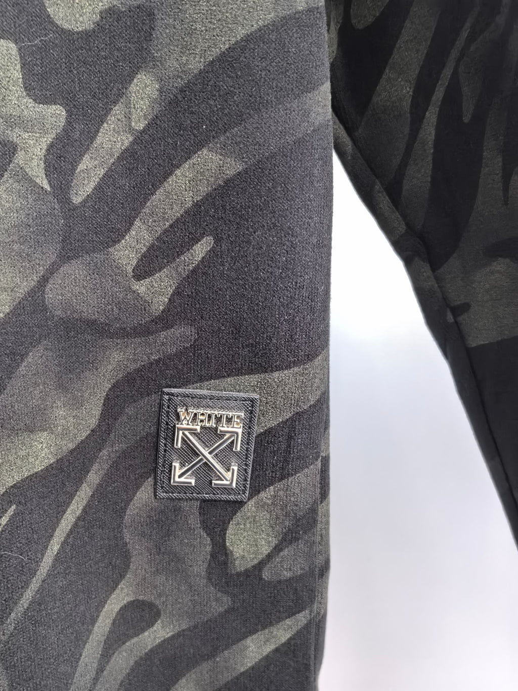 Camo crewneck sweatshirt with rectangular logo patch on sleeve, dark gray