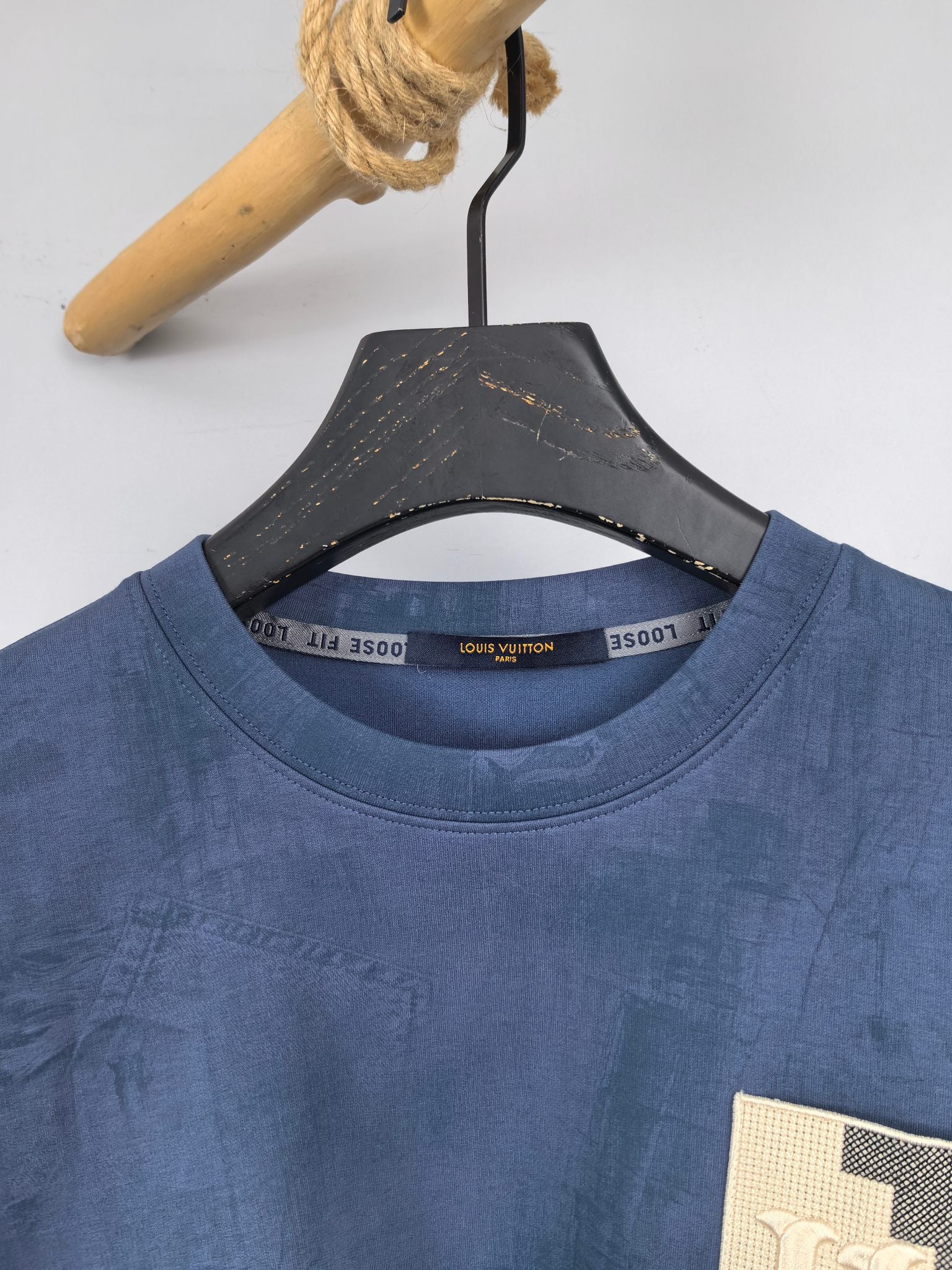 Blue Louis Vuitton crewneck sweatshirt neckline with brand tag