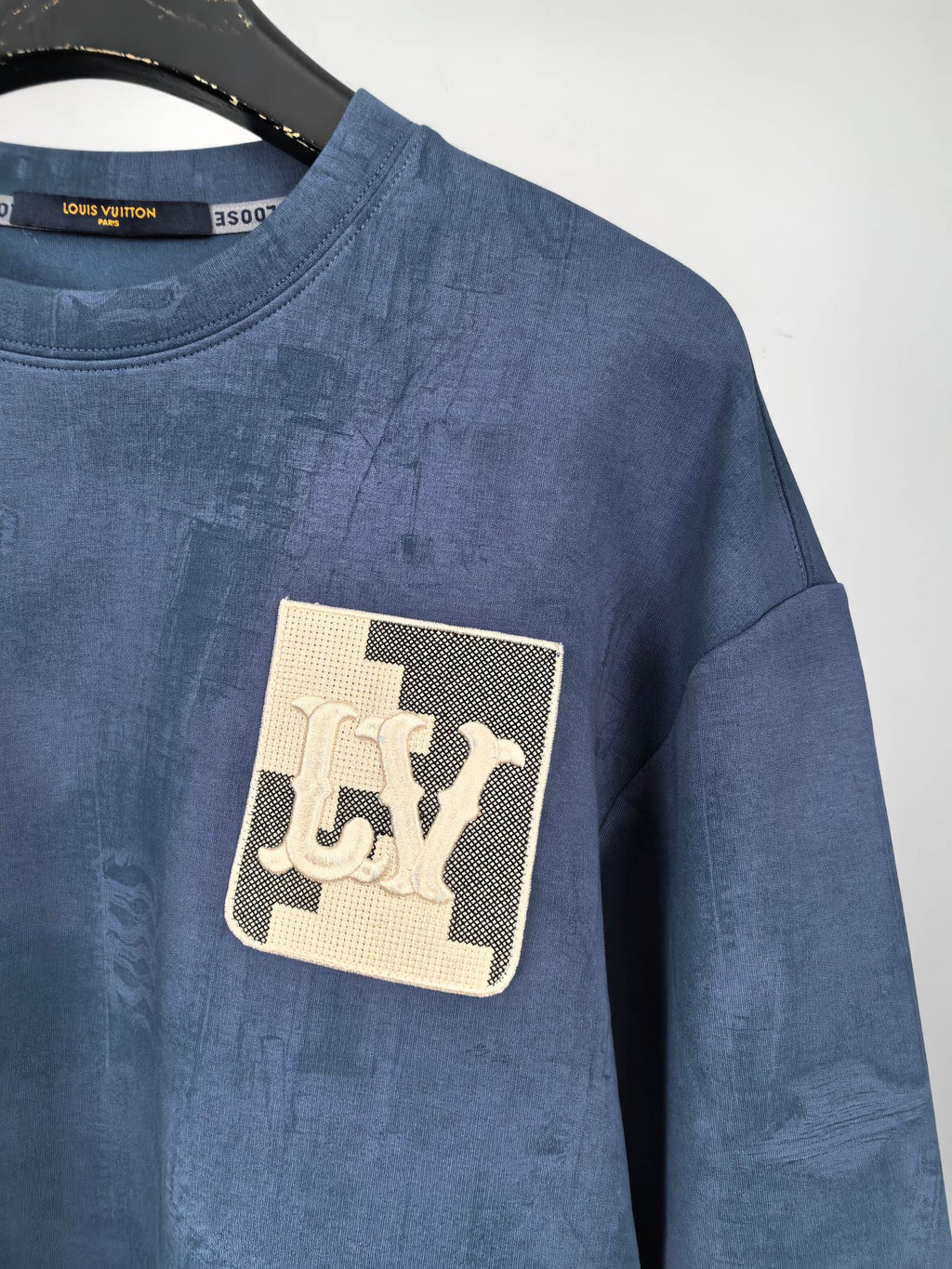 Blue Louis Vuitton crewneck sweatshirt with gold-tone logo patch