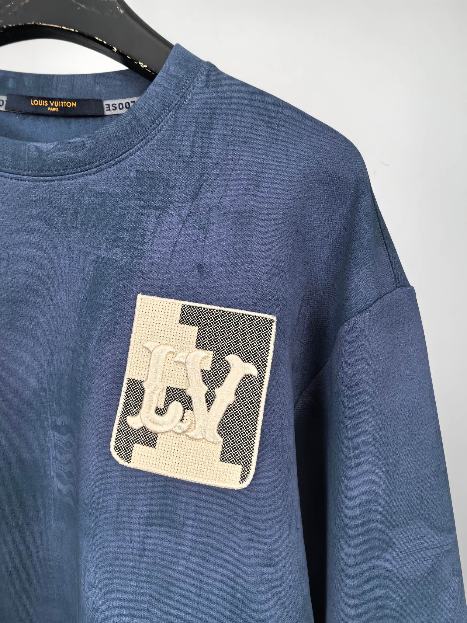 Blue Louis Vuitton crewneck sweatshirt with gold-tone logo patch