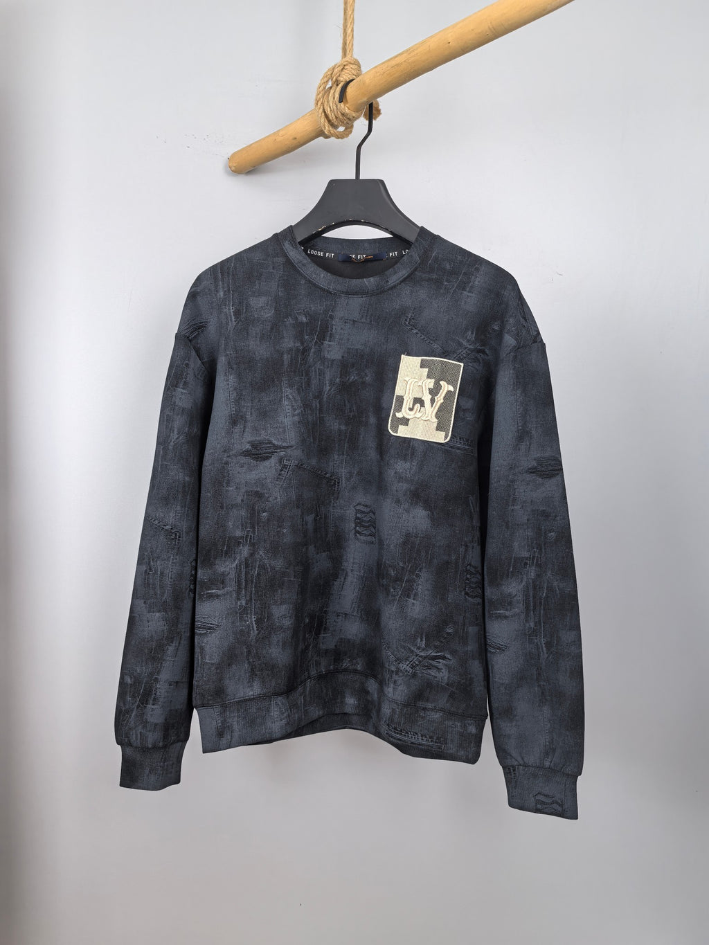Dark navy long-sleeve sweatshirt with crew neck and LV patch chest