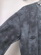 Dark navy long-sleeve sweatshirt with stitched shoulder seam and relaxed fit