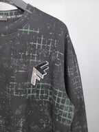 Black sweatshirt with green grid pattern and FENDI stylized logo patch