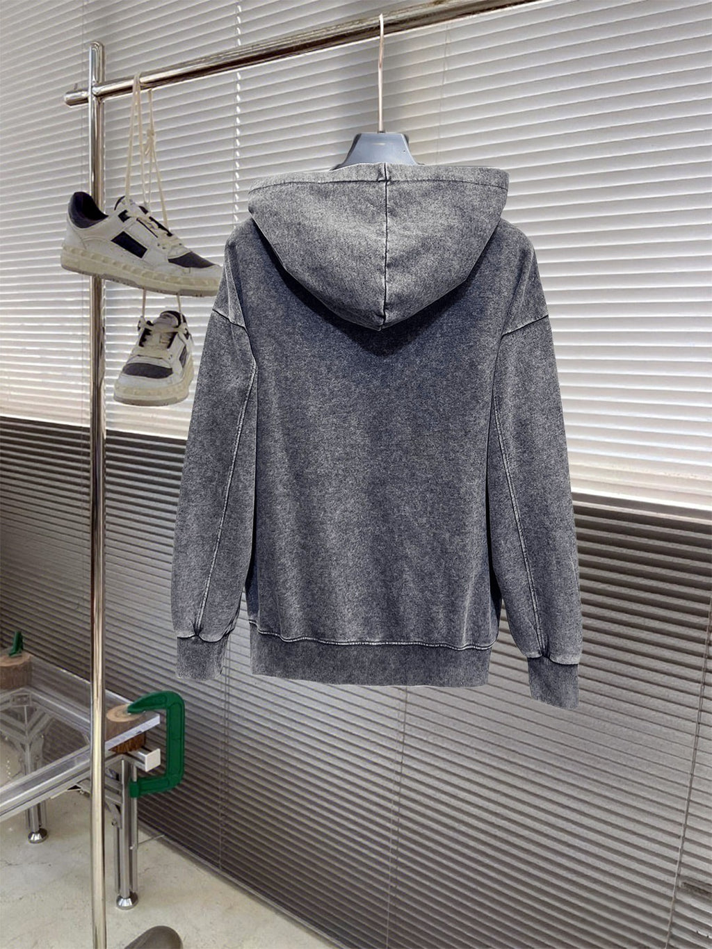 Heather gray hoodie sweatshirt, back view with hood and plain rear panel