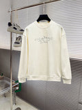 Cream long-sleeve crewneck sweatshirt with blue graphic lettering across chest.