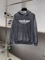 Heather gray long-sleeve hoodie sweatshirt, front view with chest graphic and pouch pocket