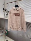 Beige FENDI long-sleeve hoodie sweatshirt on a hanger, front pocket and hood.