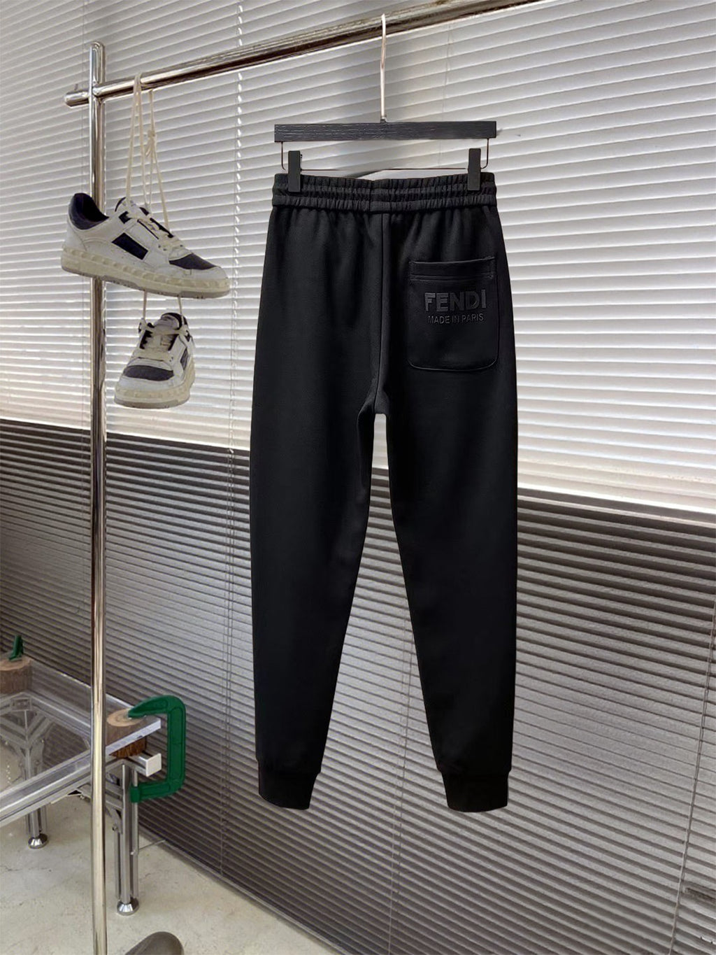 Fendi pants in dark black with elastic waistband and side patch logo