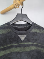 Prada crewneck sweatshirt with studded triangle patch at neckline, dark gray and green stripes.