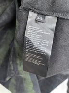 Prada sweatshirt inside size tag marked 2XL, with care and fabric info.