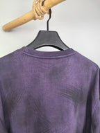 Purple sweatshirt back view on hanger, crew neckline and shoulder seam.