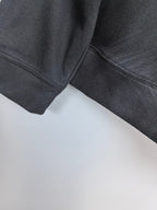 Long-sleeve crewneck shirt sleeve and side seam detail, dark charcoal