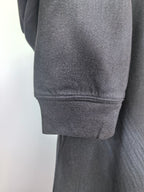 Long-sleeve crewneck shirt sleeve cuff and hem, dark charcoal fabric