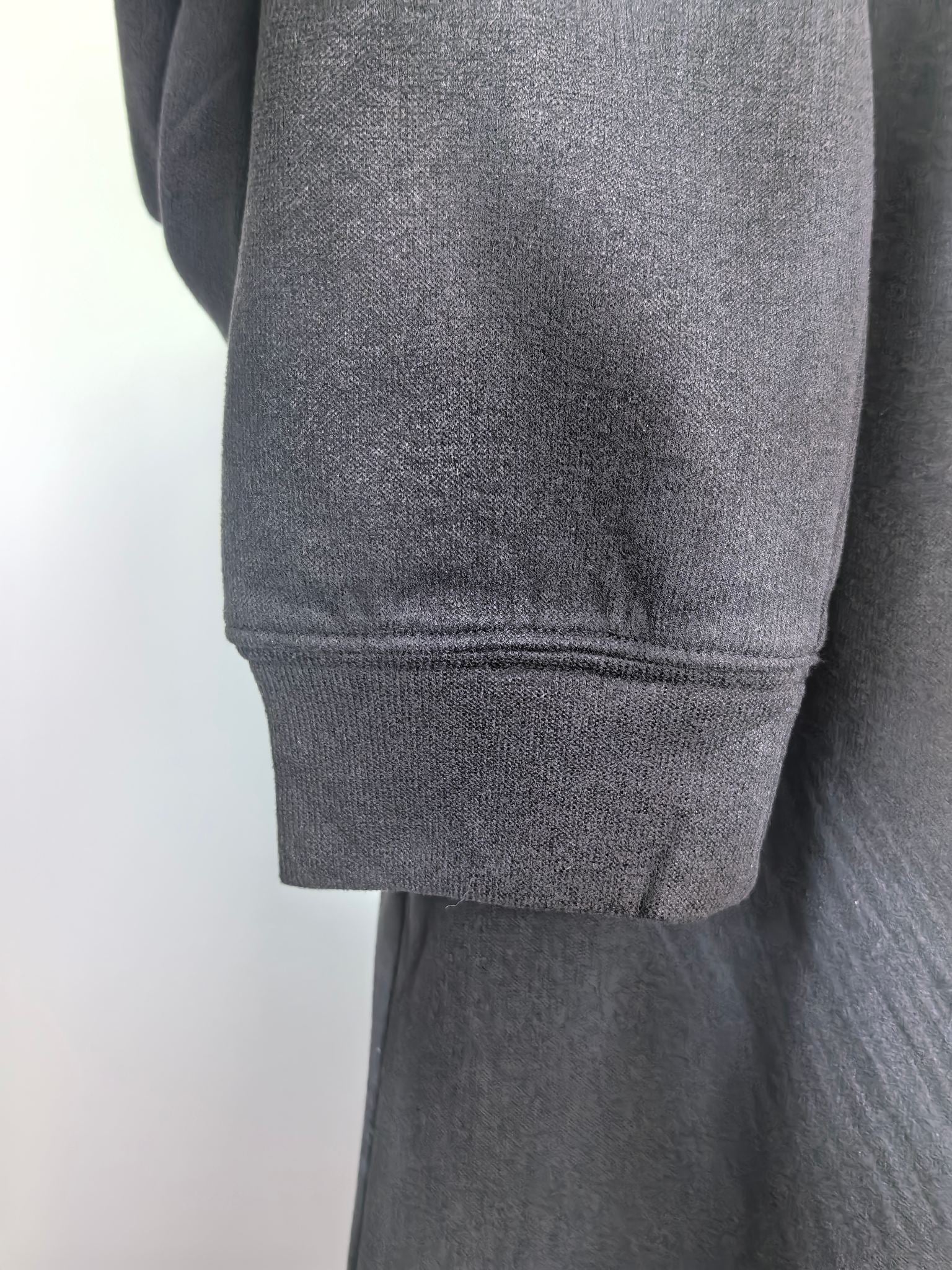 Long-sleeve crewneck shirt sleeve cuff and hem, dark charcoal fabric