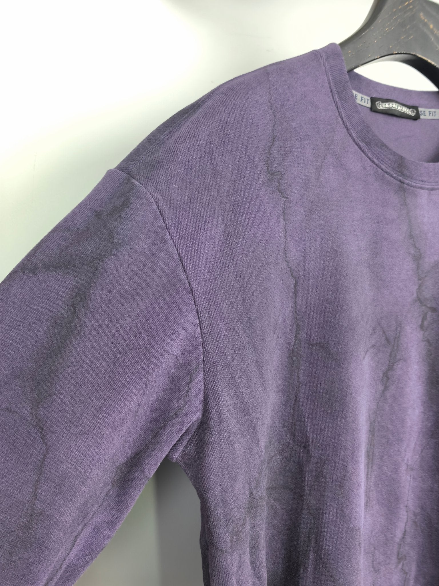 Purple long-sleeve crewneck sweatshirt with relaxed shoulder seam detail