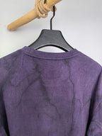 Purple crewneck sweatshirt back view on hanger with neckline seam