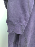 Purple sweatshirt hem with ribbed cuff and lower sleeve seam detail