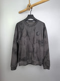 Dark gray marble print crewneck long-sleeve sweatshirt with small chest badge