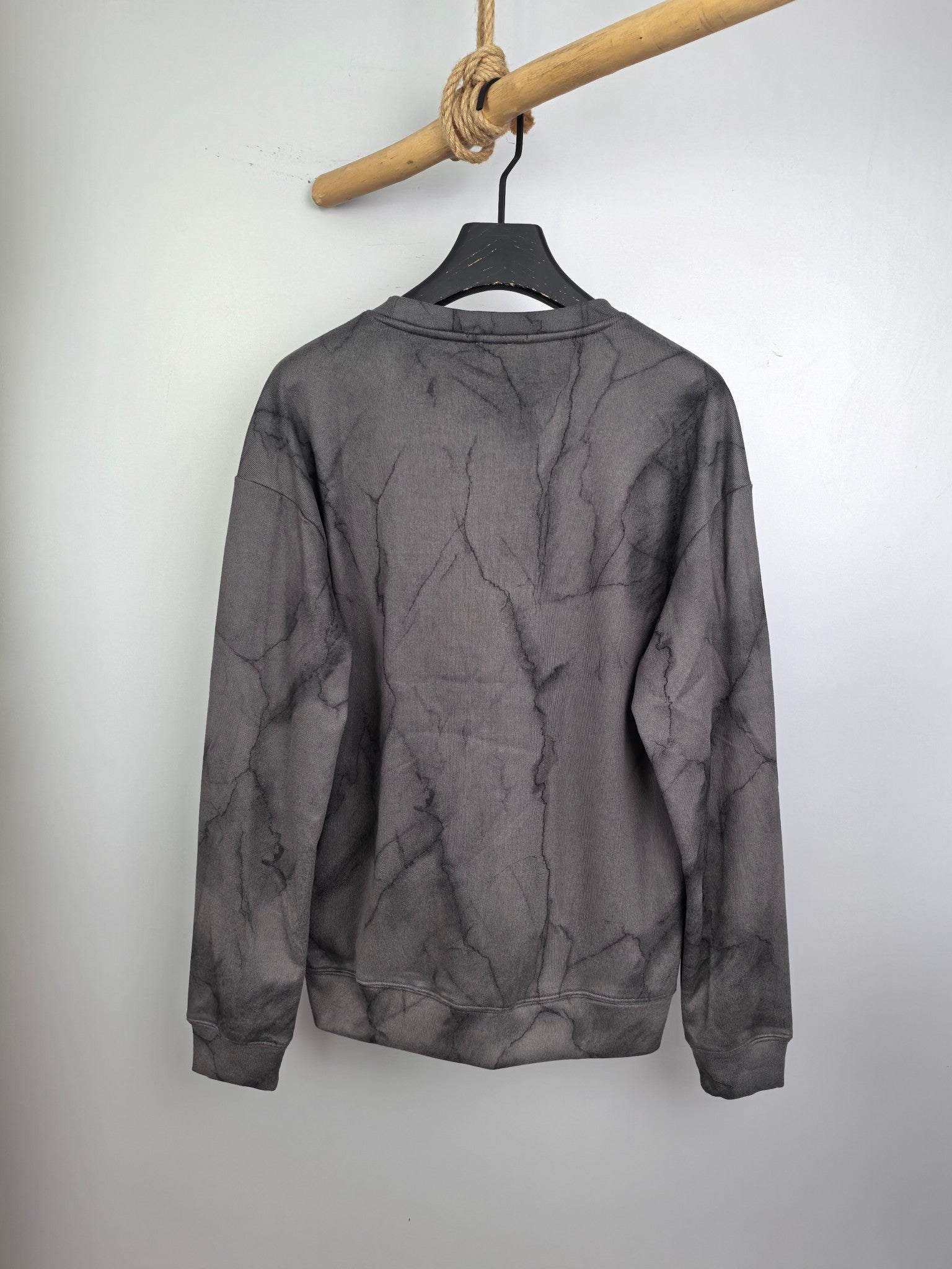 Dark gray marble print crewneck long-sleeve sweatshirt, back view