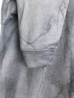 Dark gray marble print sweatshirt with ribbed cuff and hem detail