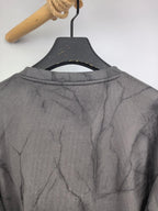 Dark gray marble print long-sleeve sweatshirt with crew neckline, back view