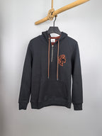 Dark gray zip-up hoodie with orange drawstrings and Burberry logo patch on chest